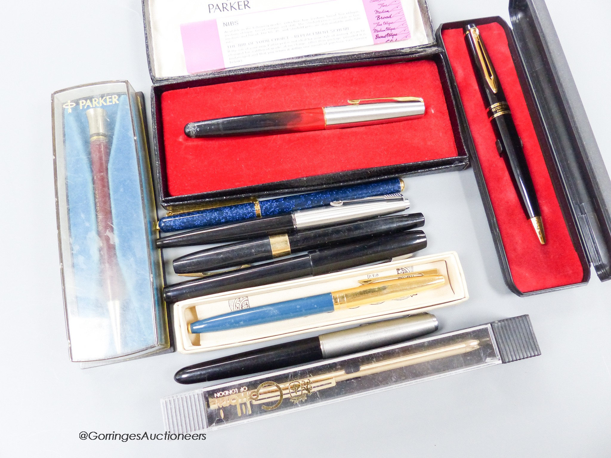 An assortment of fountain pens and ball point pens